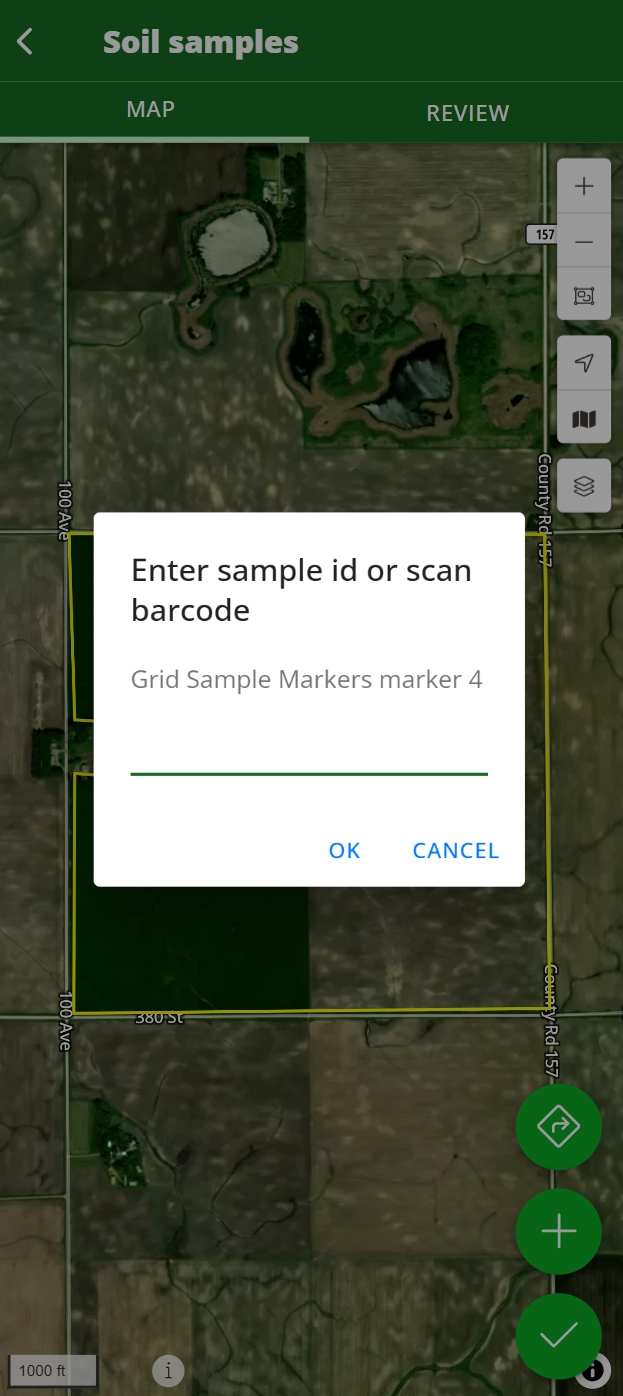 The mobile soil samples map with a sample point selected and the enter or scan screen open.
